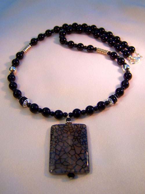 handmade beaded jewellery 444n - 22 inch handcrafted necklace, dragon vein pendant, black glass and silver plate beads